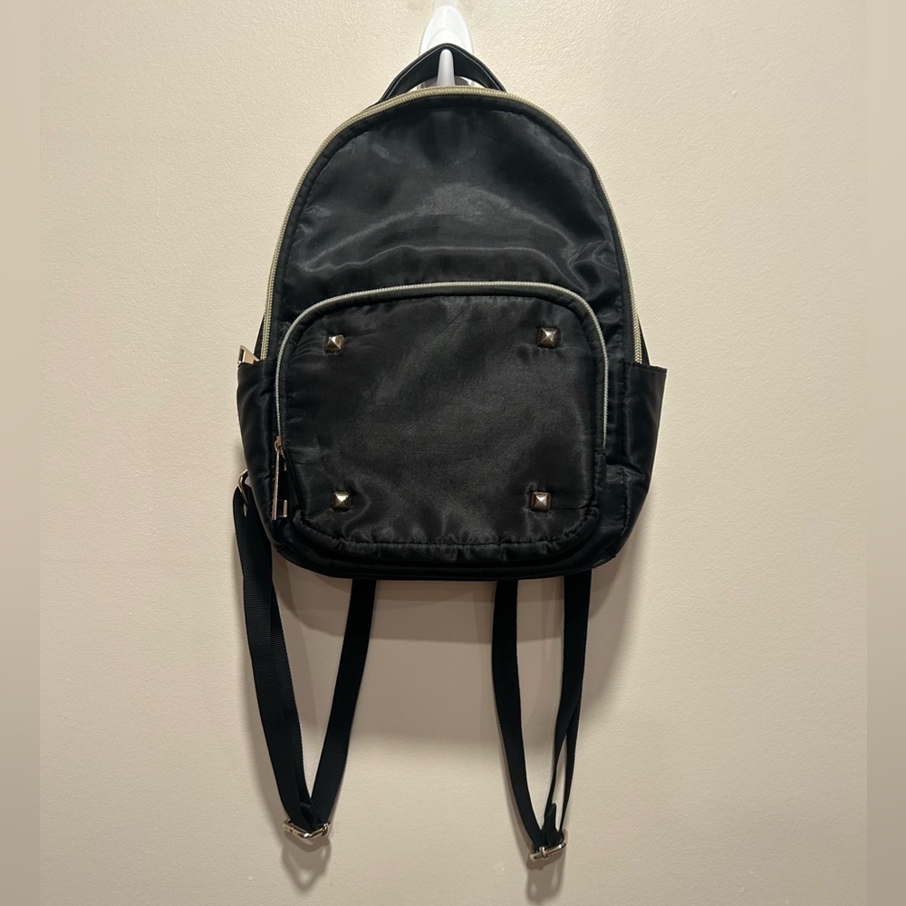 Stylish Black Backpack with Silver Accents